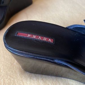 Prada 3 “wedges with silver tone buckle. Patent leather with leather insole.